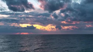 Cloudy sunset at sea