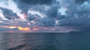 Cloudy sunset at sea