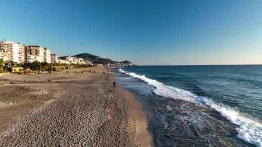 sea filmed on a drone in the sunset
