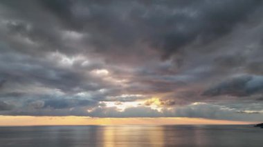 Cloudy sunset at sea