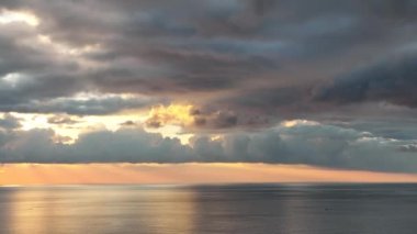 Cloudy sunset at sea