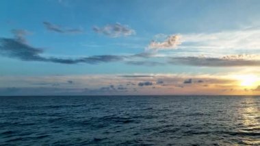 sea filmed on a drone in the sunset