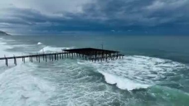 Storm at sea filmed on a drone in the sunset