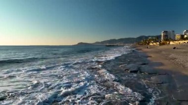 sea filmed on a drone in the sunset
