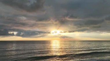 Cloudy sunset at sea