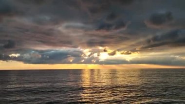 Cloudy sunset at sea