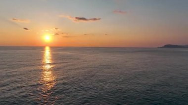 Cloudy sunset at sea