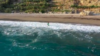 Storm at sea filmed on a drone in the sunset