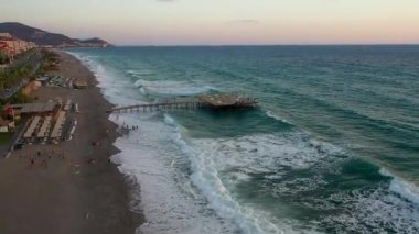 Storm at sea filmed on a drone in the sunset