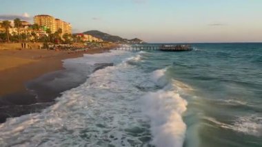Storm at sea filmed on a drone in the sunset