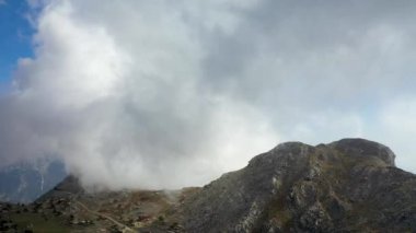 Clouds high in the mountains Aerial view