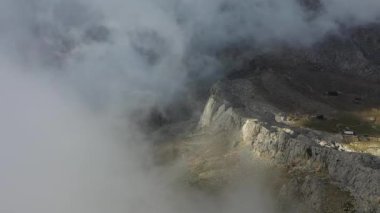 Clouds high in the mountains Aerial view