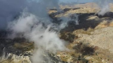 Clouds high in the mountains Aerial view