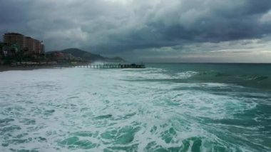 Storm at sea filmed on a drone in the sunset