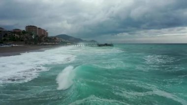 Storm at sea filmed on a drone in the sunset