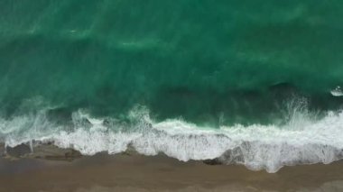Storm at sea filmed on a drone in the sunset