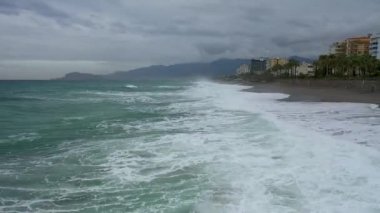 Storm at sea filmed on a drone in the sunset