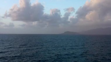Storm at sea filmed on a drone in the sunset
