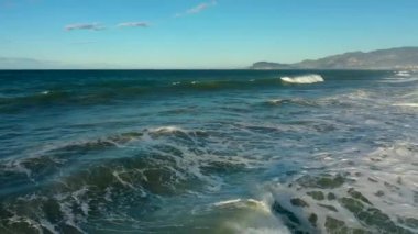 Storm at sea filmed on a drone in the sunset