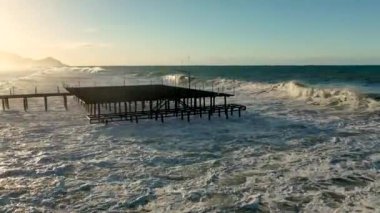 Storm at sea filmed on a drone in the sunset