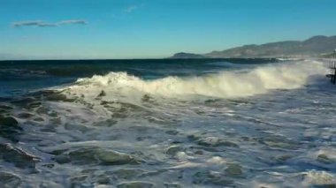 Storm at sea filmed on a drone in the sunset