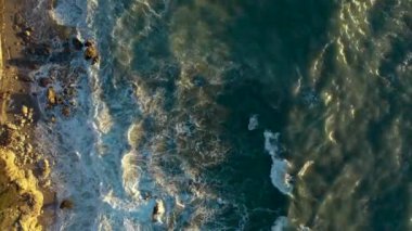 Storm at sea filmed on a drone in the sunset