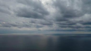 Storm at sea filmed on a drone in the sunset