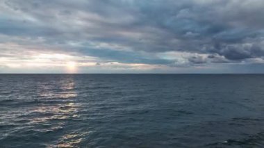 Cloudy sunset at sea