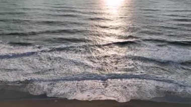sea filmed on a drone in the sunset