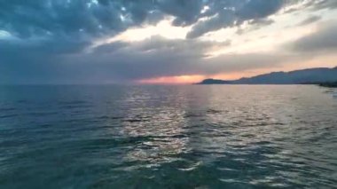 Cloudy sunset at sea