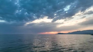 Cloudy sunset at sea