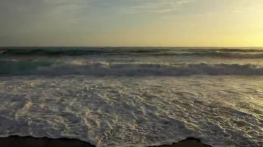 Storm at sea filmed on a drone in the sunset