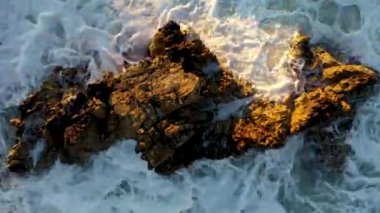 Storm at sea filmed on a drone in the sunset