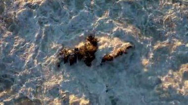 Storm at sea filmed on a drone in the sunset