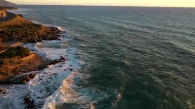 Storm at sea filmed on a drone in the sunset