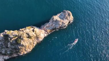 sea filmed on a drone in the sunset