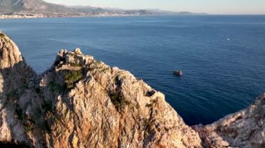 sea filmed on a drone in the sunset
