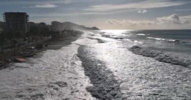 Storm at sea filmed on a drone in the sunset