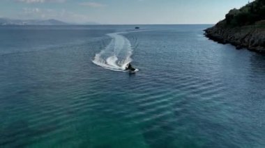 Jet ski rides around the yacht