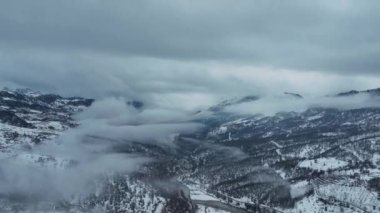 Clouds high in the mountains Aerial view