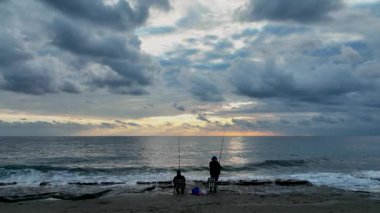 Fishing near the shore sea