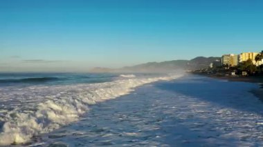 Storm at sea filmed on a drone in the sunset