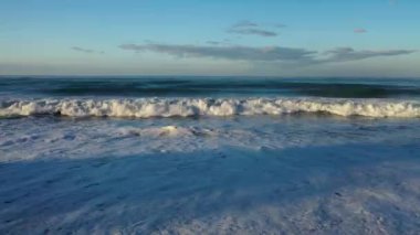 Storm at sea filmed on a drone in the sunset