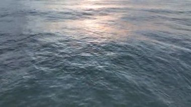 Storm at sea filmed on a drone in the sunset