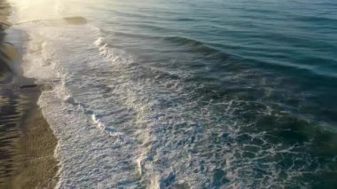 Storm at sea filmed on a drone in the sunset