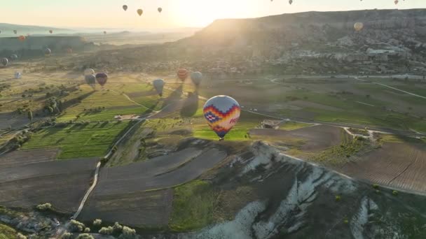 Hot Air Balloons Fly Mountainous Landscape Cappadocia Turkey Aerial View — Stock video
