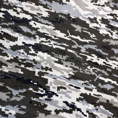 Ukrayna askeri piksel kamuflaj dokusuna sahip kumaş. Gri, kahverengi ve yeşil pikselli kamuflaj desenli kumaş. Ukrayna askerlerinin resmi üniforması yaklaşıyor.