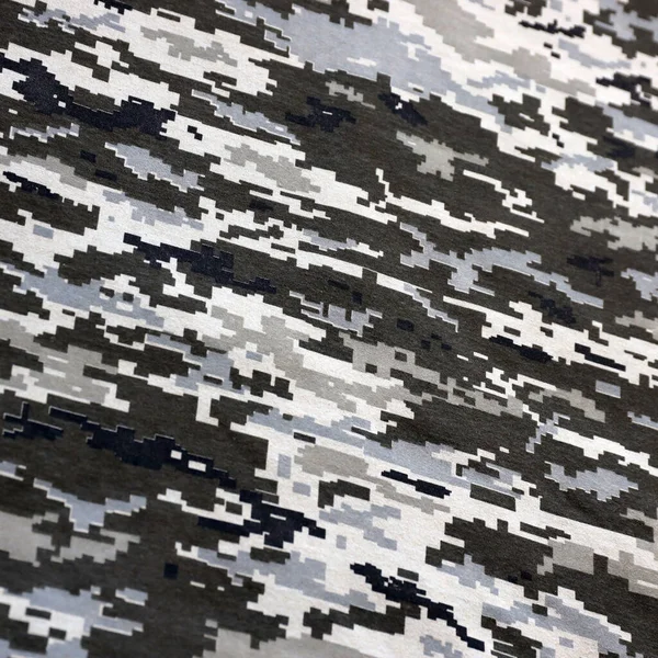 ウクライナ軍のピクセル化されたカモフラージュの質感の生地 グレー ブラウン グリーンのピクセル形状の迷彩柄の布 ウクライナ兵の公式制服が閉鎖 — ストック写真