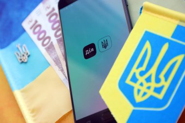 TERNOPIL, UKRAINE - APRIL 24, 2022: Diia app on smartphone screen. Diya is a mobile application with web portal and a brand of e-governance in Ukraine for citizens