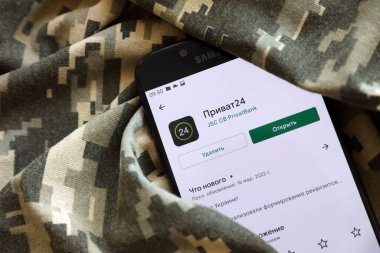 TERNOPIL, UKRAINE - APRIL 24, 2022: Privatbank banking application on smartphone screen. Privatbank is important commercial bank in Ukraine